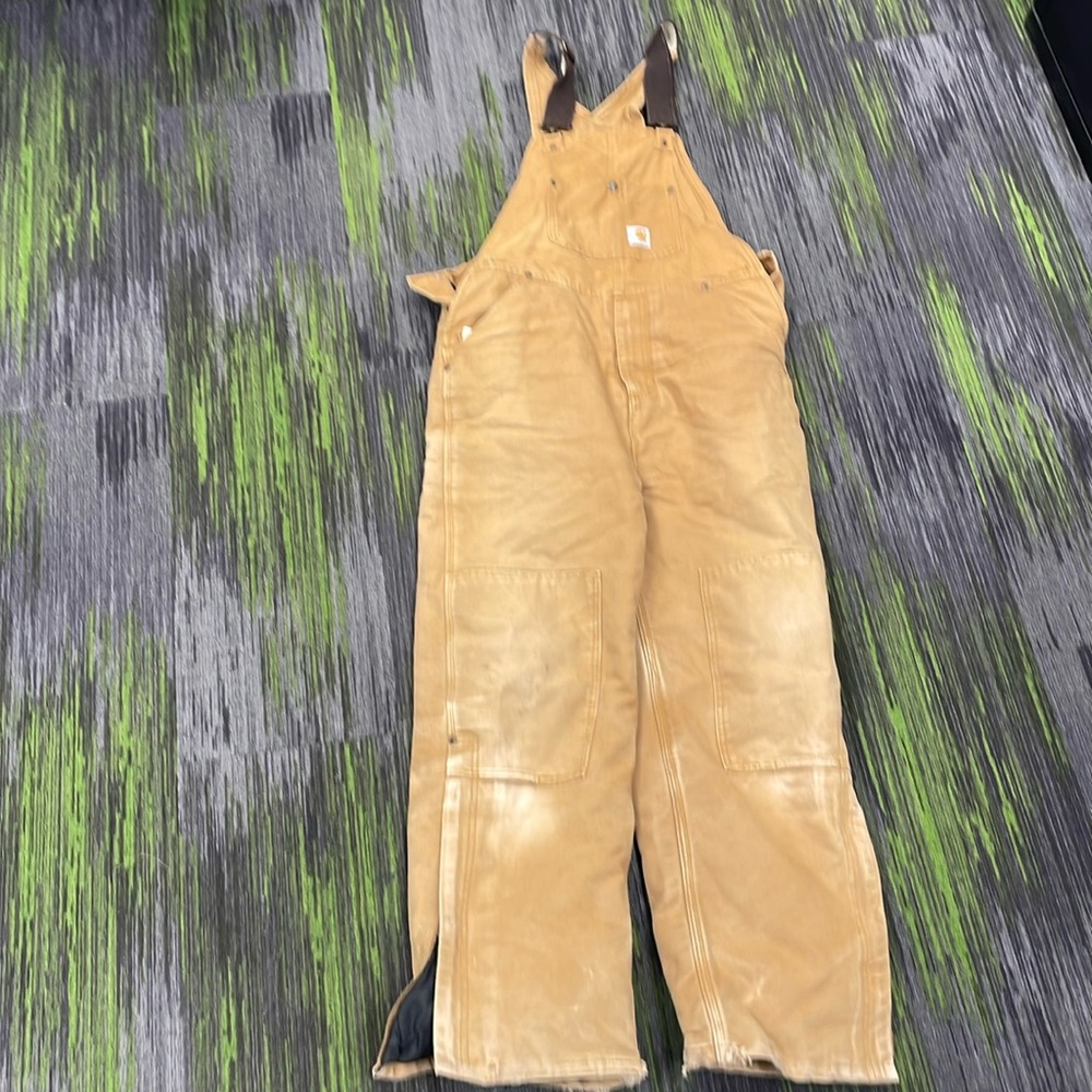 Insulated carhartt bibs size 16.   Crotch was stitched up by prof seamstress